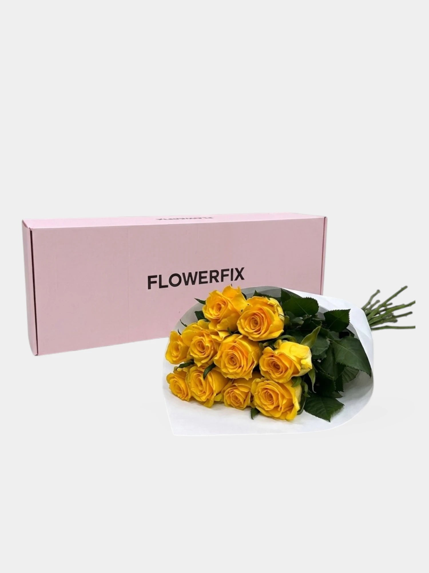 Bouquet of yellow roses with a pink 'FLOWERFIX' box on a white background