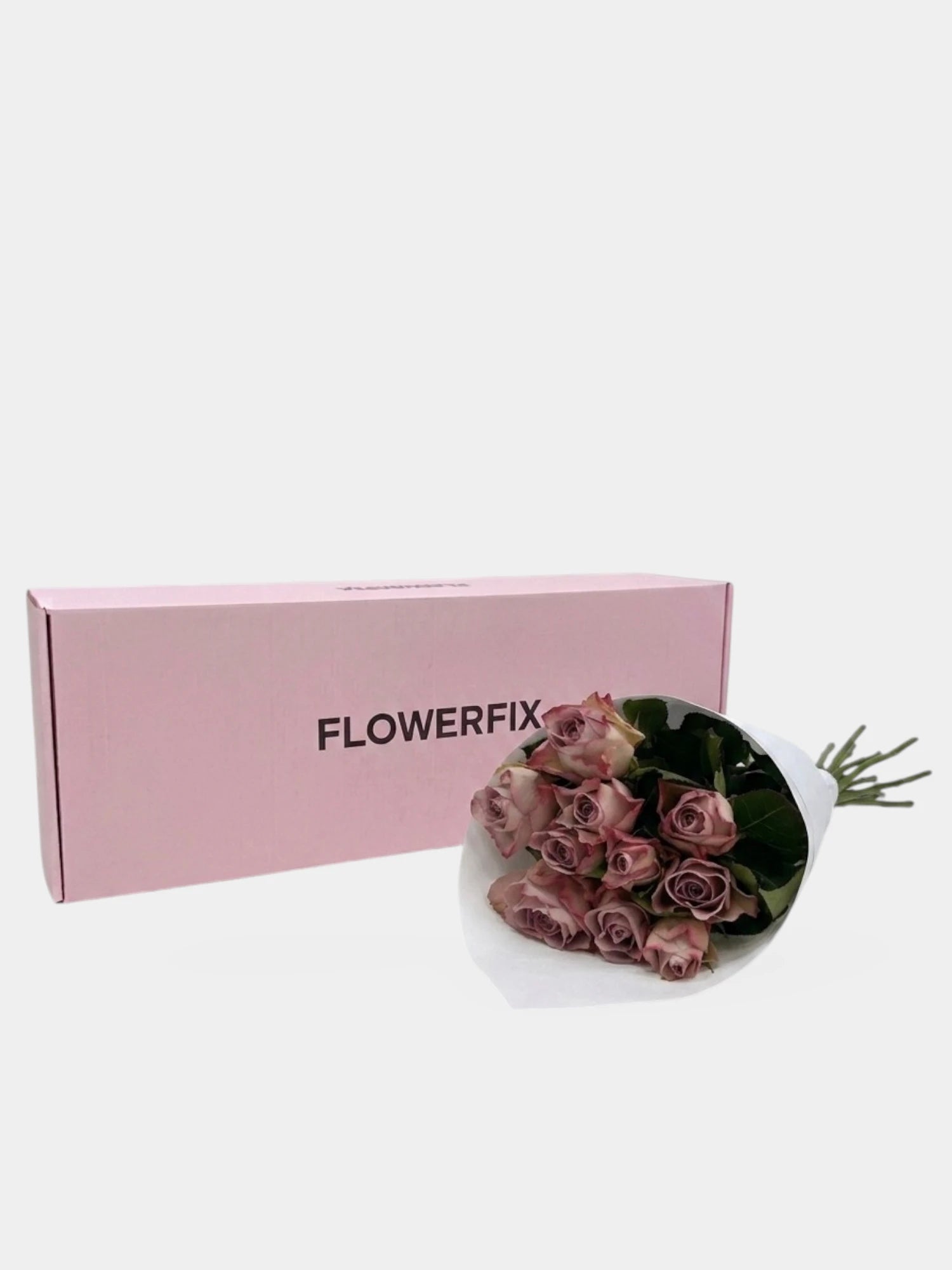 Pink box with 'FLOWERFIX' branding next to a bouquet of purple roses on a white background